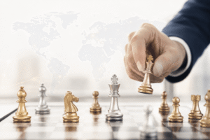 Peças de xadrez representando planejamento estratégico de mobilidade global